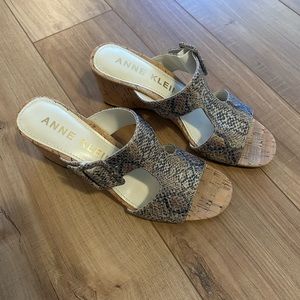 Women’s size 8 snake skin wedge sandals.